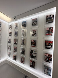 a display of magazines on a wall