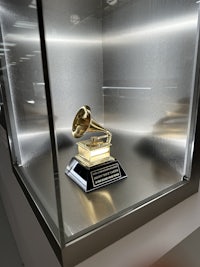 a grammy trophy in a glass case