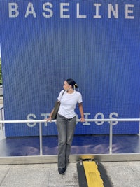 a person leaning on a railing